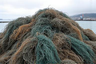 A pile of old fishing nets collected for recycling